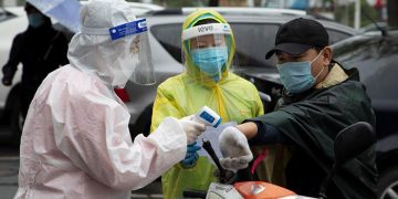 No new cases reported in China for first time since pandemic began