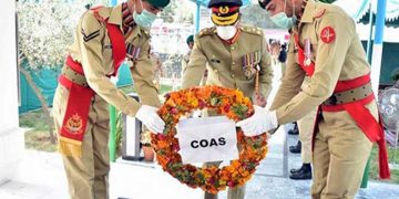 Flowers laid at graves of Karnal Sher Khan, Lalak Jan on behalf of COAS