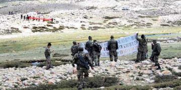 New Delhi says India, China have agreed to reduce tensions over border dispute