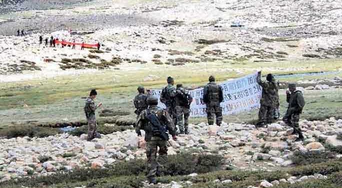New Delhi says India, China have agreed to reduce tensions over border dispute